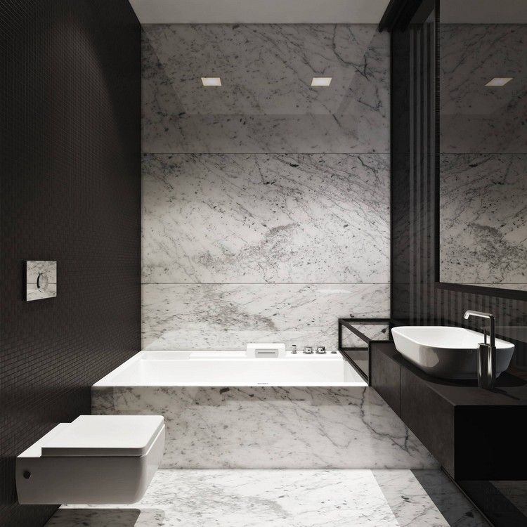 Kombinerar svart och vit marmor i badrummet