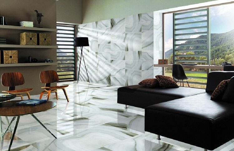 Marmorgolv i hemmet-vardagsrum-lyx-väggbeklädnad-marmor-hörnsoffa-läder-vägghylla