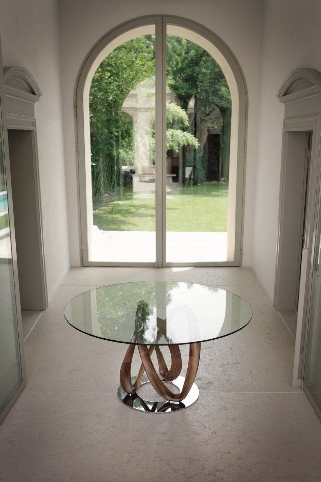 Modernt-bord-med-glas-topp-metall-fot-massivt trä-dekorativt-snidade-oändlighet