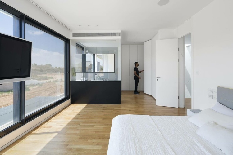 möbler-grå-stora-rum-säng-moderna-trä-golv