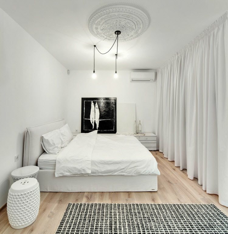 sten-accent-vägg-vit-väggmålning-svart-deco-möbler-idé-matta-rutig