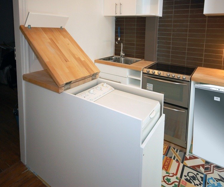 Integrera tvättmaskinens toplader i köket