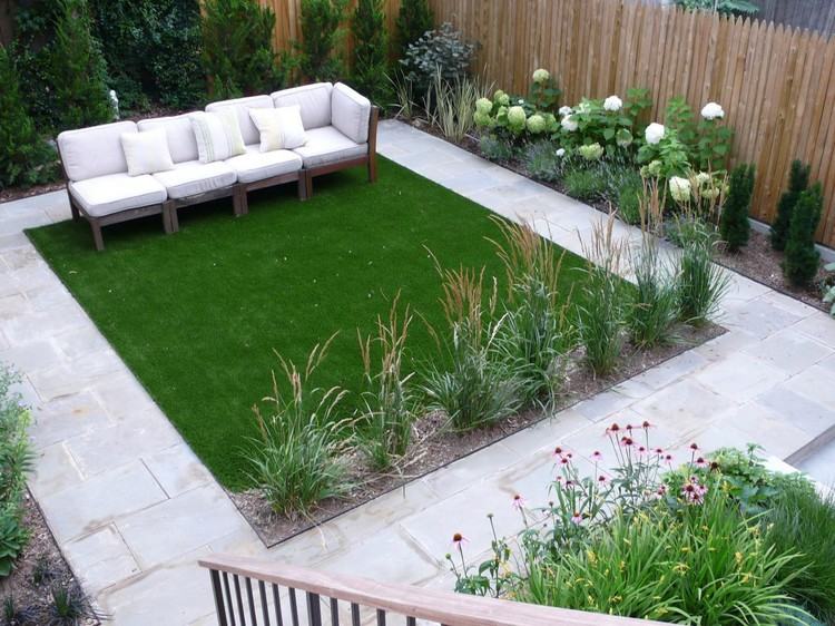 modern-trädgård-design-gräsmatta-ziergraeser-trä-soffa