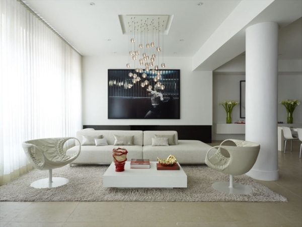 minimalism i vardagsrummet vitt glas ljuskrona platt skärm
