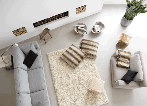 minimalism vardagsrum matta päls kudde öppen spis