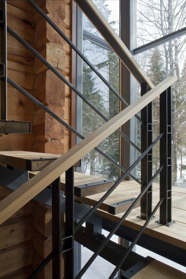 Timmerstuga interiördesign glasvägg trä modern inredning