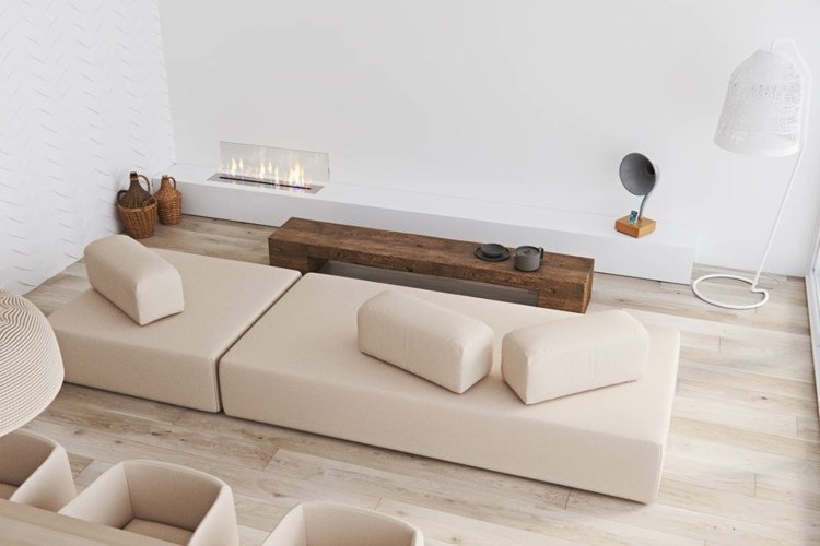 minimalistisk soffa öppen spis träbord