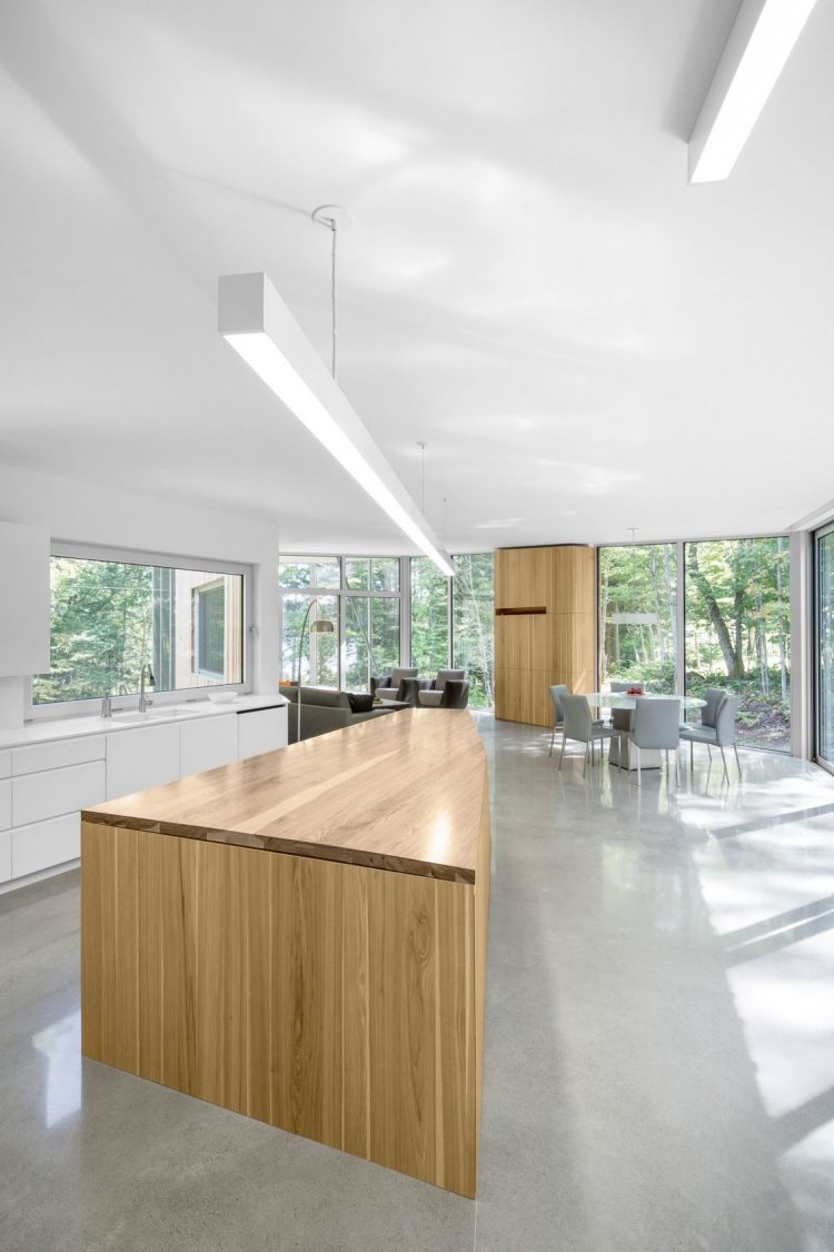 minimalistiskt-levande-modernt-öppet-kök-trä-kök-ö-betong-golv