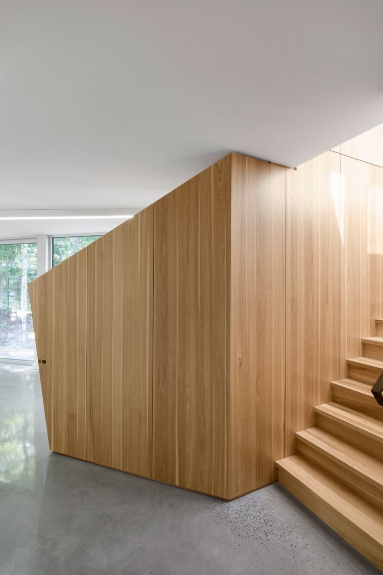 minimalistisk-levande-modern-interiör-väggbeklädnad-trä-betong-golv