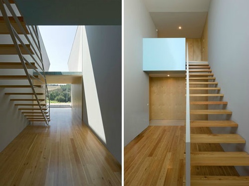 minimalistisk inredning av trätrappa