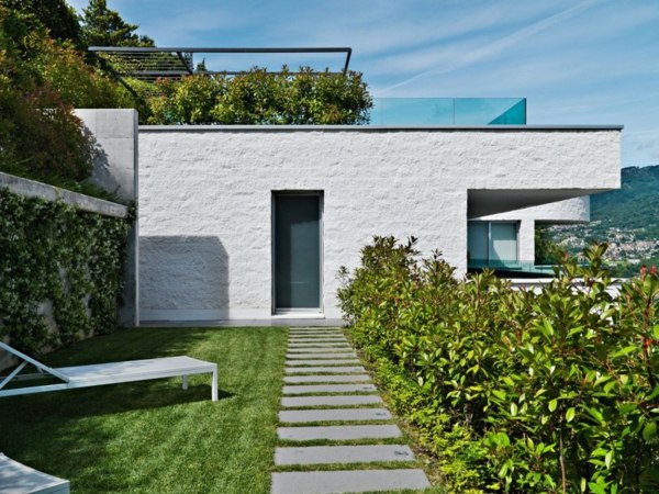 Hus Schweiz modern arkitektur trädgård takterrass glasräcke