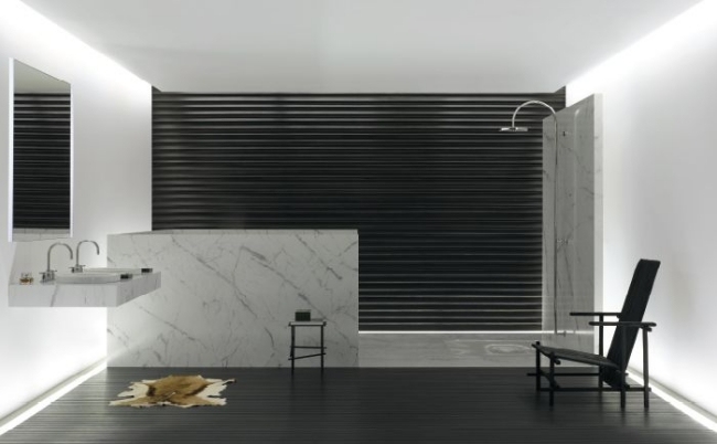 minimalistiskt badrum marmor svart led remsor golv