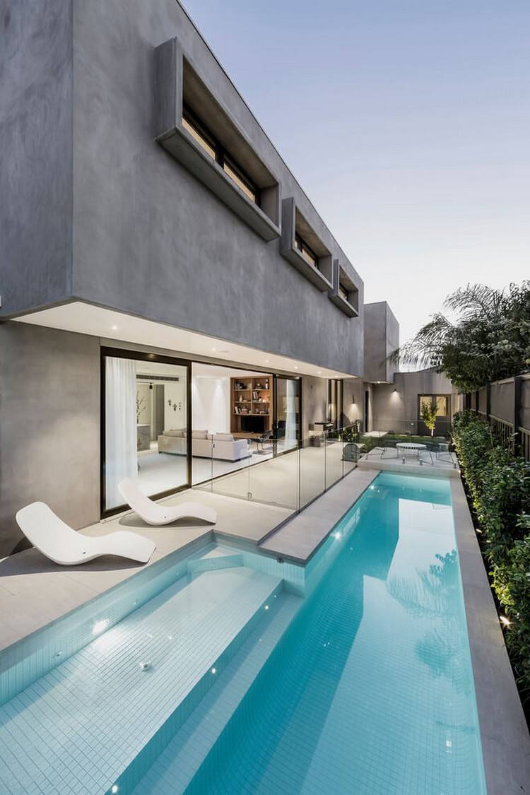 betonghus-pool-minimalistisk-fasad-cantilever-belysning