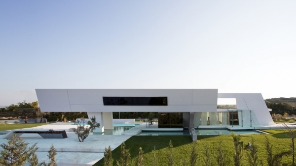 minimalistisk husdesign med geometriska former från sidan