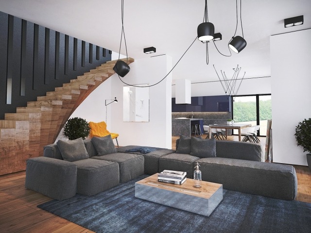 Vardagsrum-svängande trappor-trä-golv-soffa-set-grå-hängande lampor