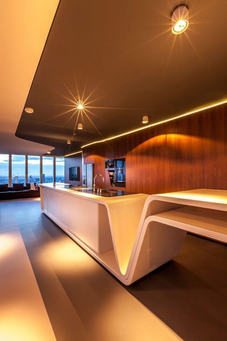 modern-levande-krökt-vägg-valnöt-kök-vardagsrum-belysning