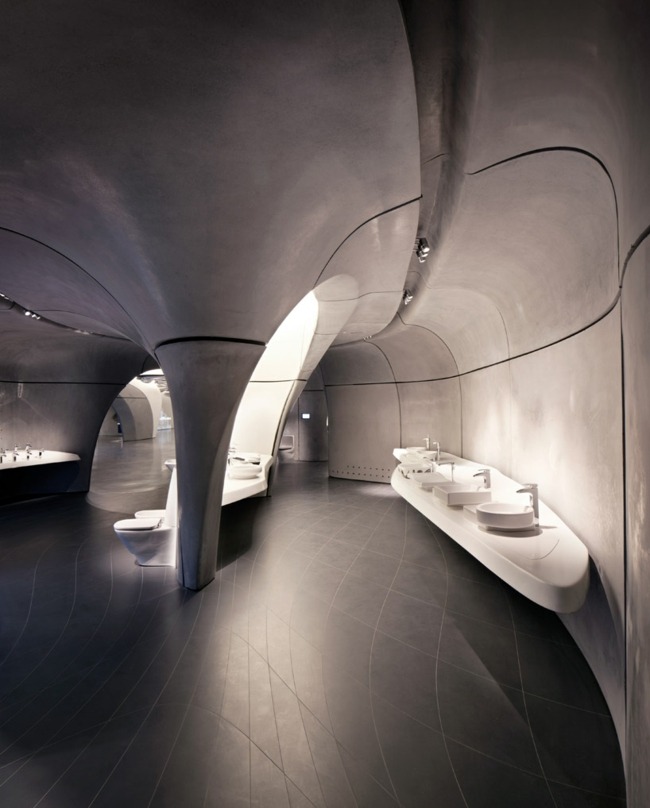 modern badrumsutställning london betongväggar