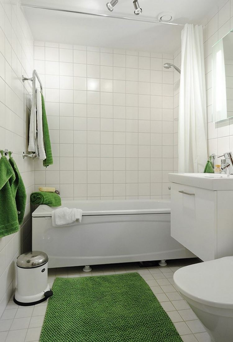 modernt-badrum-design-kakel-litet-badrum-grönt-slätt-vitt-raka linjer