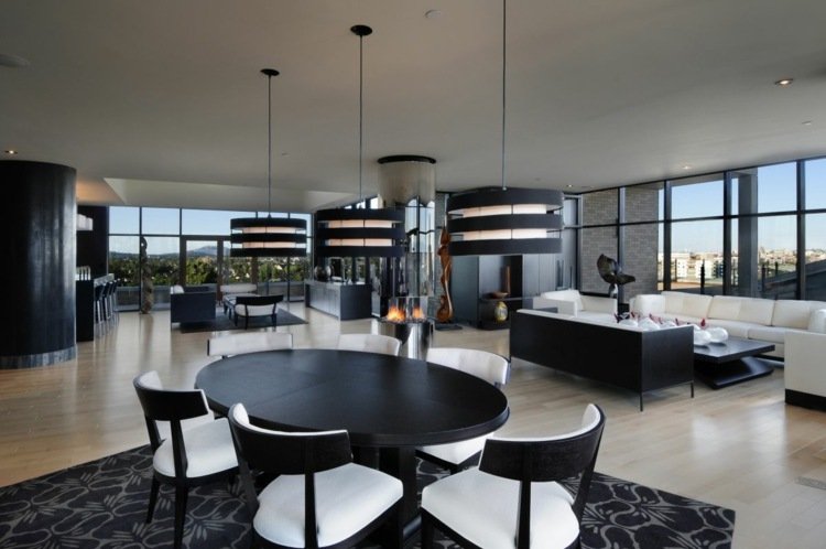 inredning modern matsal oval matbord svart och vitt interiör öppet vardagsrum