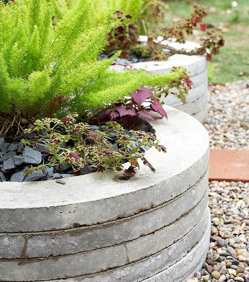 coola trädgårdsdesignidéer-vintergröna växter betongkrukor