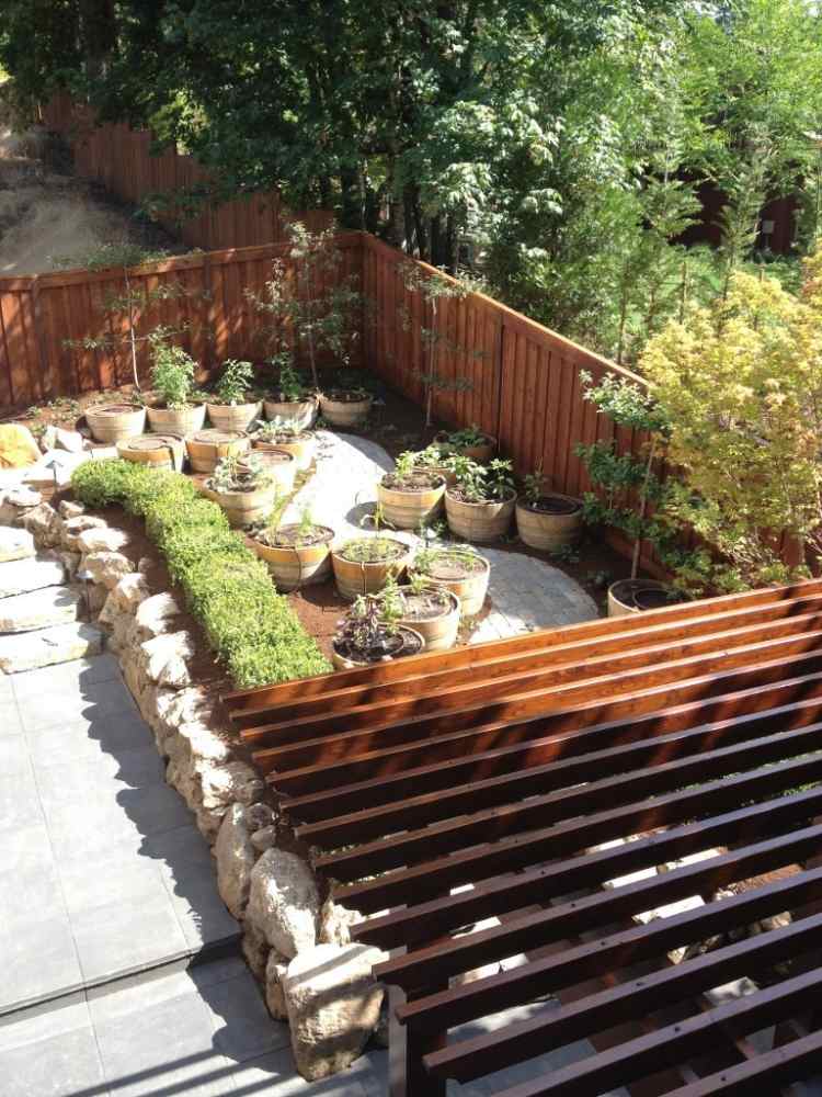 modern-trädgård-design-idéer-tips-trädgård-terrasserad-tak-trä-kalksten