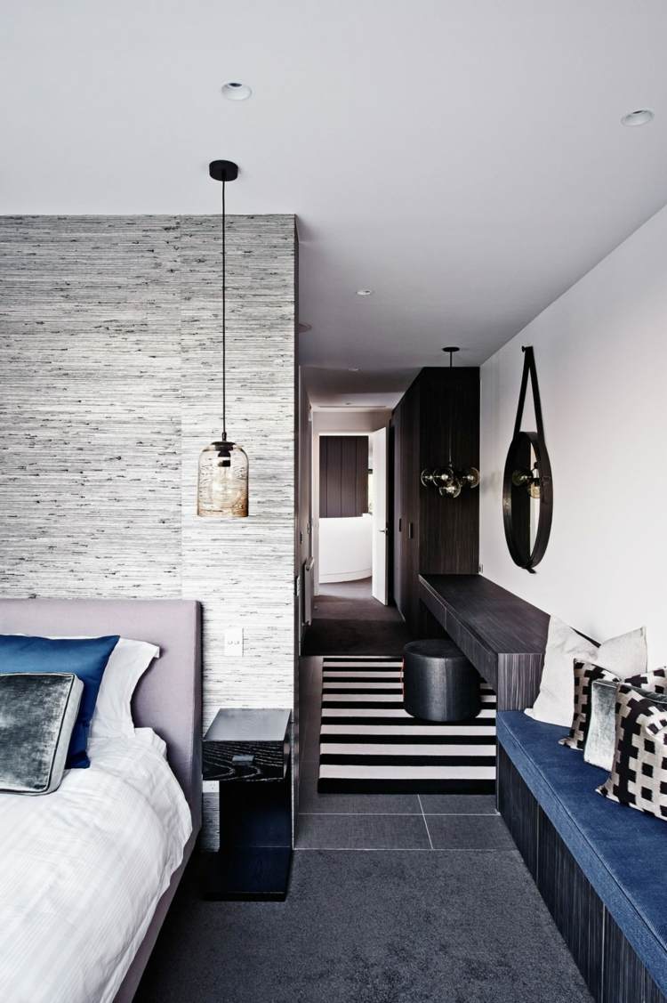 sovrum design säng grå ränder bänk hus