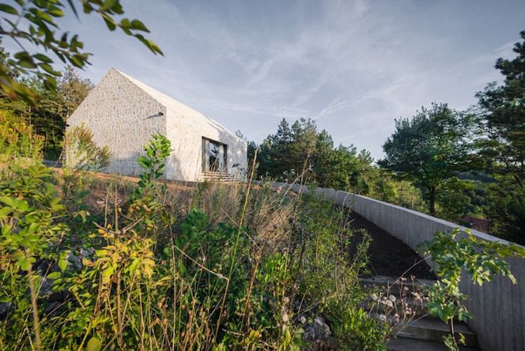 moderna sten fasad hus landskap staket betong
