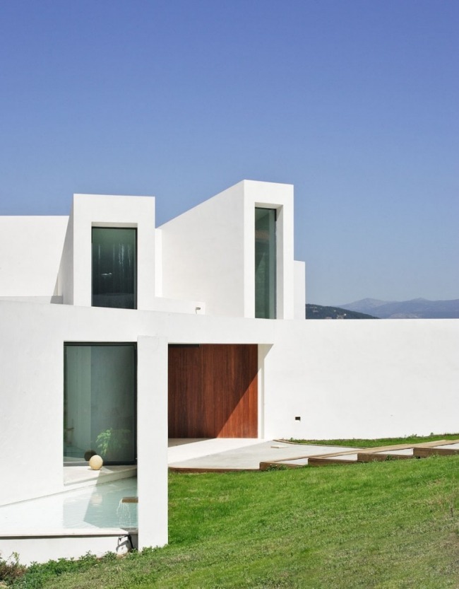 framträdgård äng el viento modern villa på en marmorsten