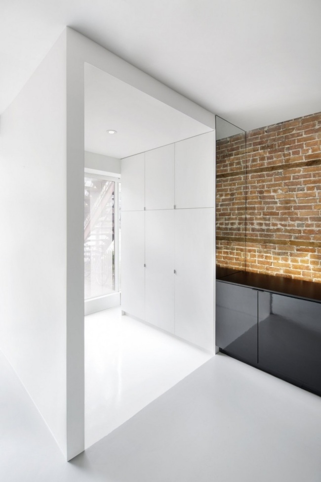 modern lägenhet montreal access innergård kök tegelvägg
