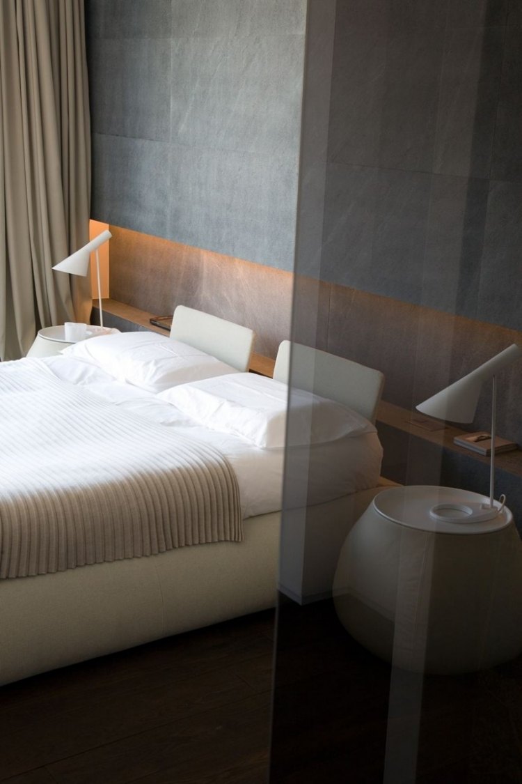 modern-lägenhet-sovrum-väggpaneler-sten-look-indirekt-belysning