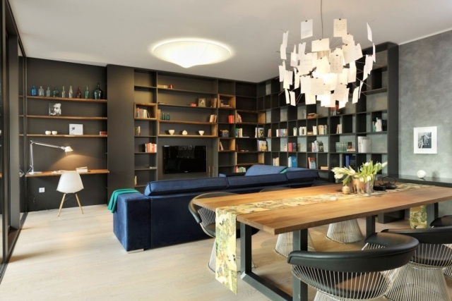 modern lägenhetsinredning öppen design-vardagsrum-matsal-svart accentvägg