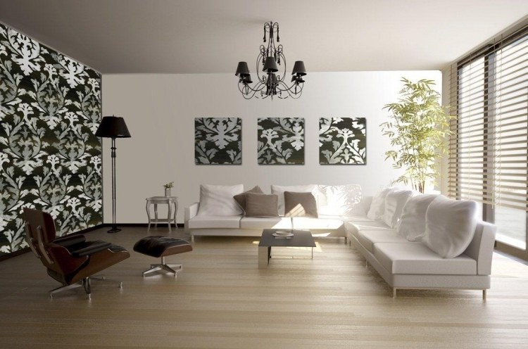 väggdesign-svart-vitt-vardagsrum-barock-mönster-tapeter-soffa-fåtölj-ljus
