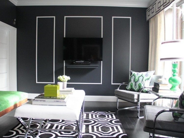 väggdesign-svart-vit-matta-mönster-fåtölj-klädsel-grå-tv-bord