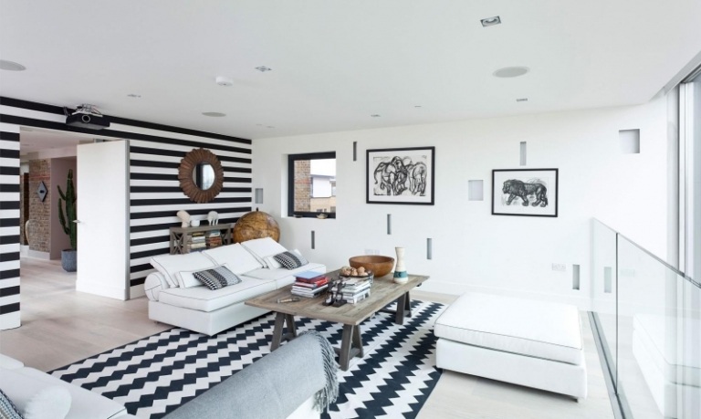 Väggdesign i svart och vitt-vardagsrum-ränder-sicksack-sittplatser-möbler-bilder-träbord