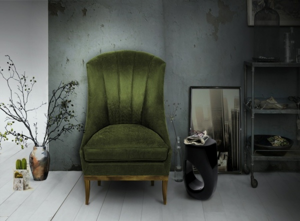 elegant-grön-fåtölj-stoppat-svart-soffbord