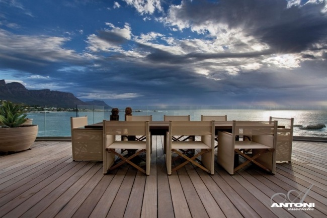 trädäck matsal möbler modern designer lägenhet med havsutsikt