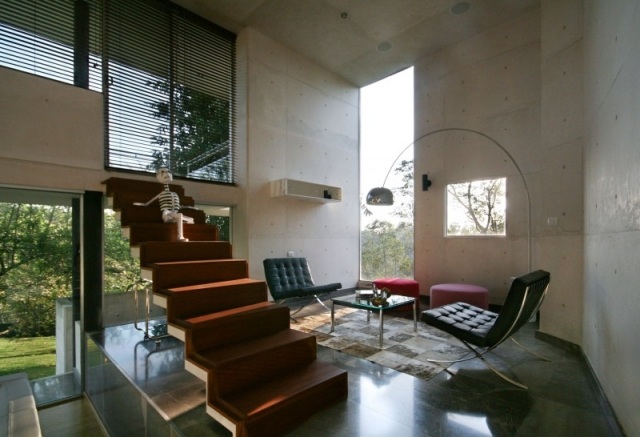 modernt betong bostadshus interiör trappor lounge område
