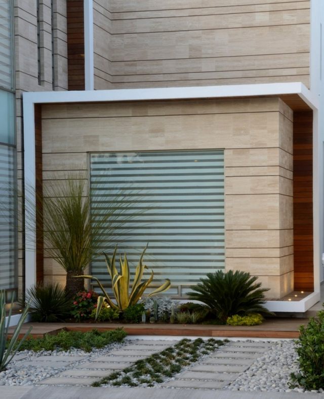 vita betongblock sten trädgård lägga upp idéer palmer gräs