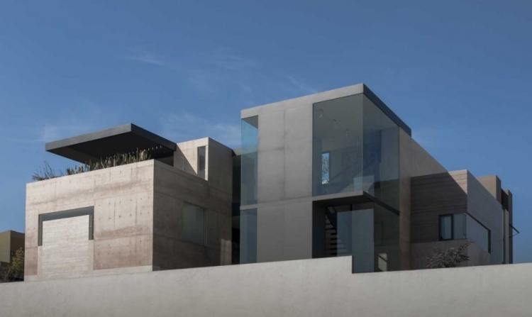 modernt enfamiljshus fasad-exponerat betongglas