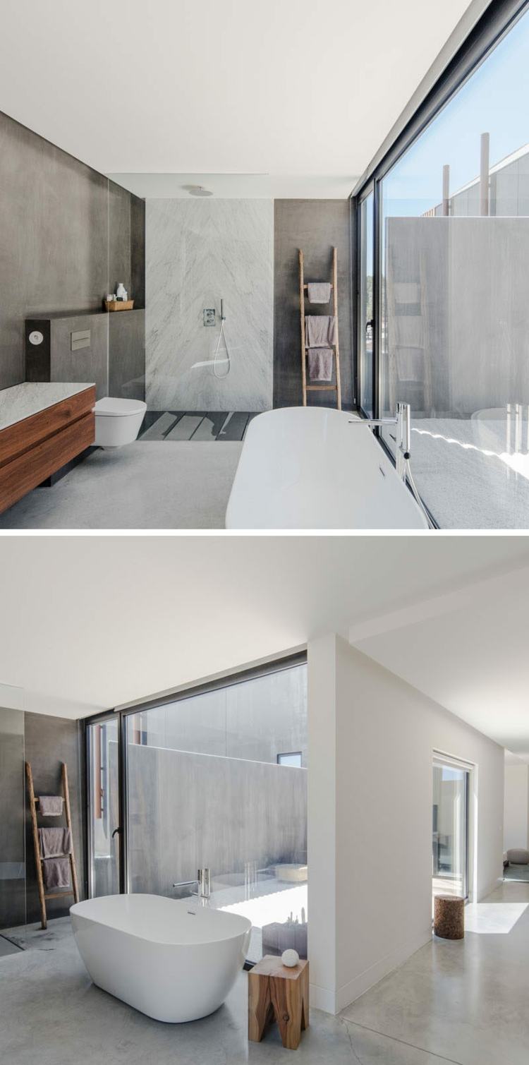 stora fönster badrum fristående badkar trägrå