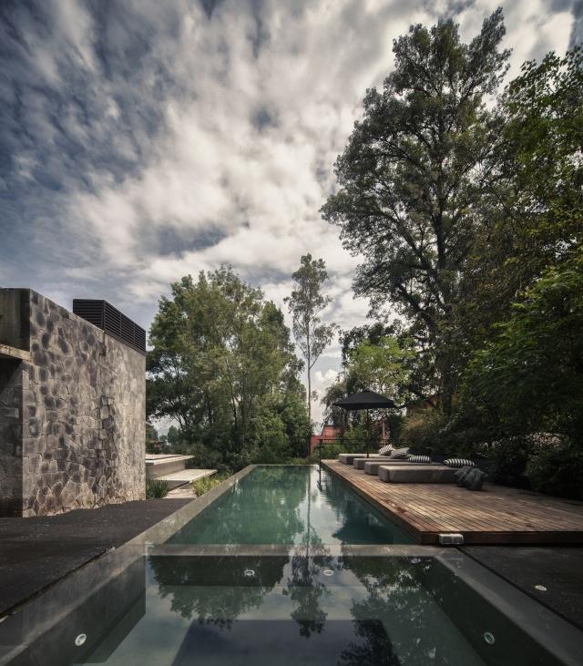 modernt hus mexico pool terrass solstolar