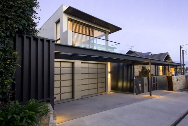 garageport design hus ståltak glasräcke