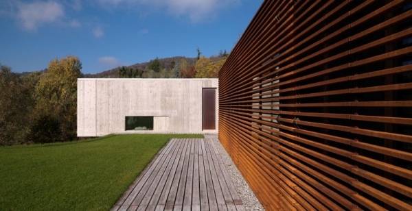 hus betong trä byggmaterial trendig exteriör design italiensk