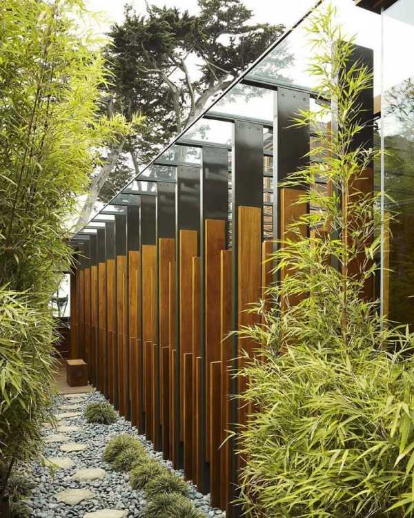 moderna trähus fällbara dörrar öppna landskap