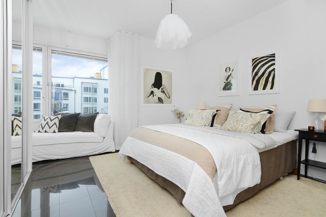 design-modern-sovrum-vit-vägg-färg-grå-golvplattor