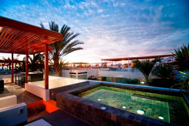 solnedgång utsikt casa seta bostadshus design med takterrass