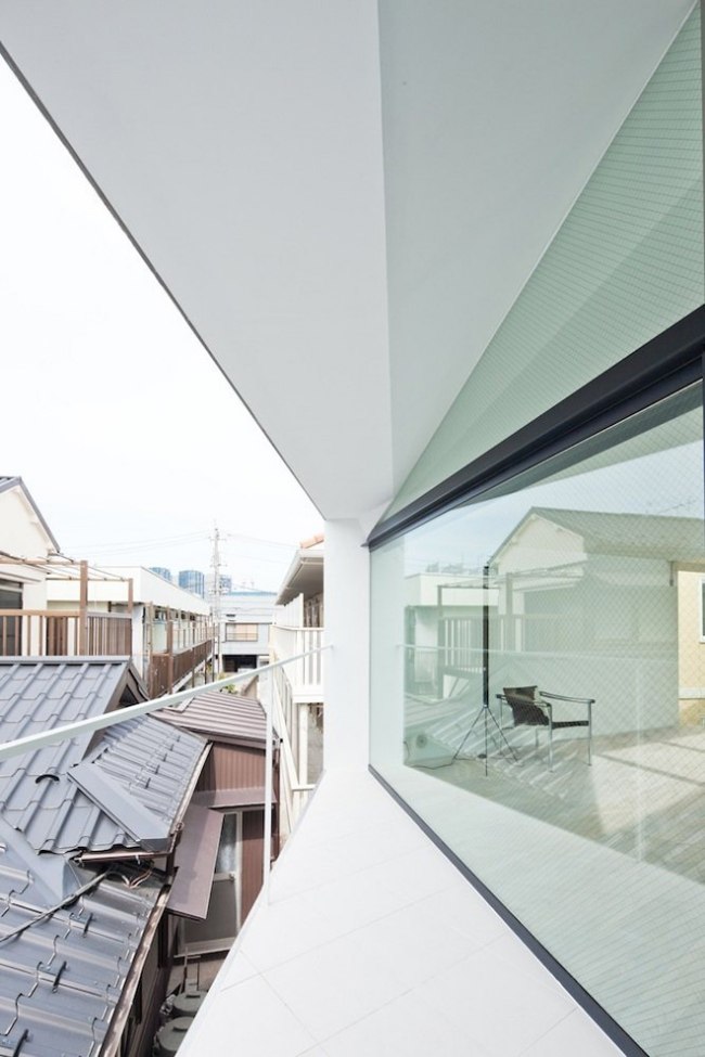 bostadshus tokyo glasväggvy apollo arkitekter