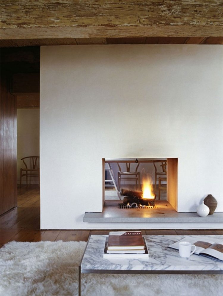 modernt vardagsrum-öppen spis-lantlig-minimalistisk-soffbord-marmor