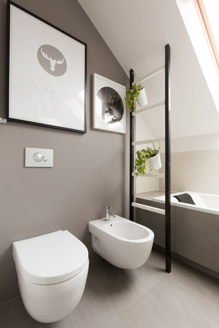 monokrom lyxig lägenhet badrum toalett bidé grå vägg