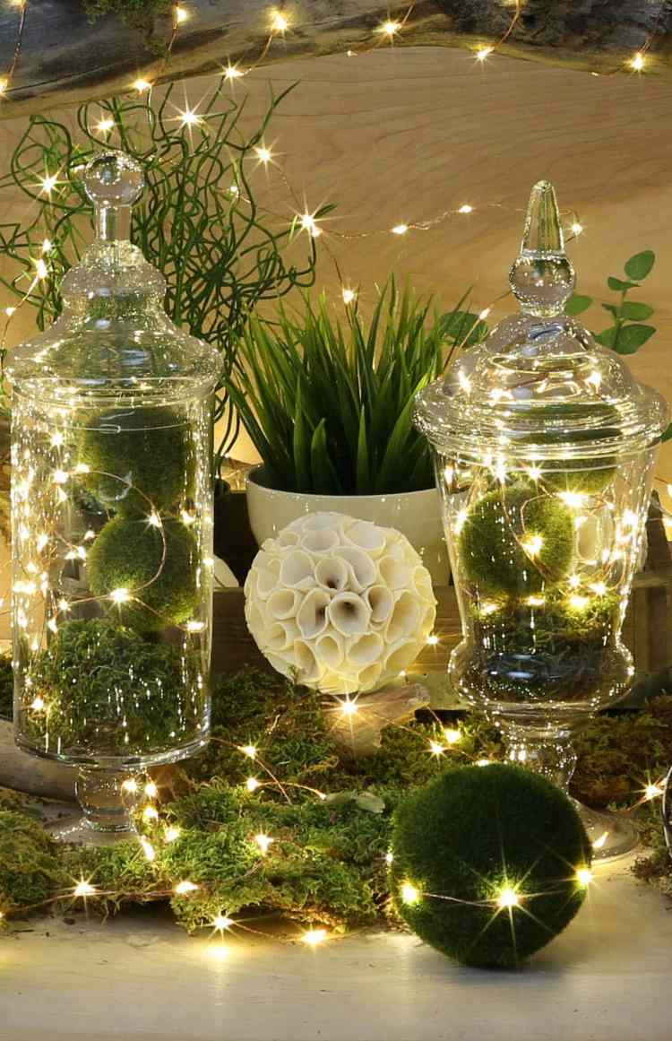 klockburk dekorera till jul mossbollar ljuskedjor blommor bordsdekorationer